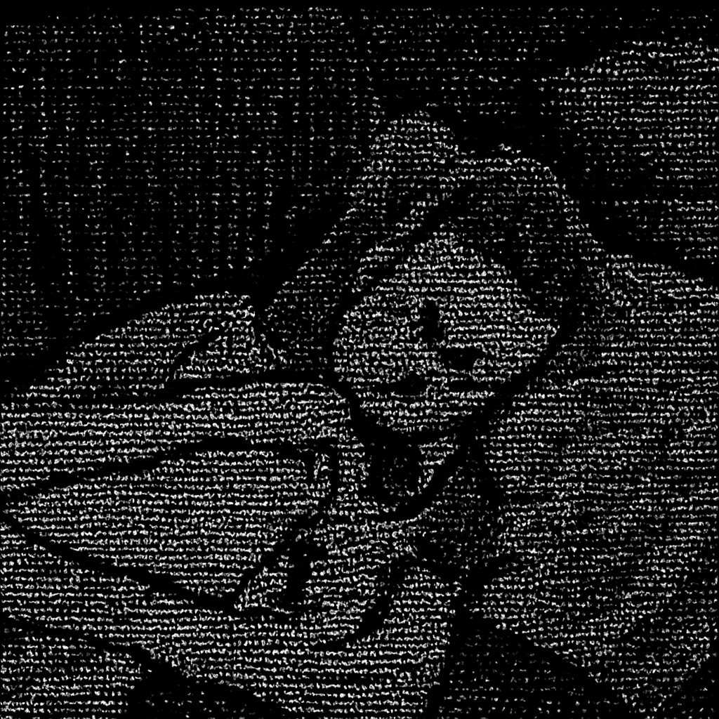 a young boy laying on a red couch holding a black and white cat