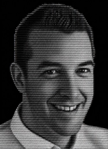 ASCII art portrait of a smiling person in grayscale.