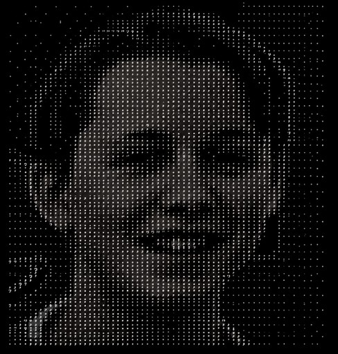 Monochrome ASCII portrait of a smiling person against a dark background