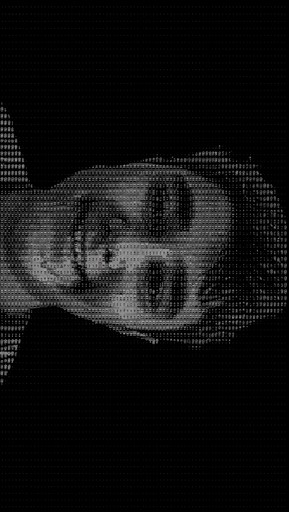 Grayscale ASCII-style portrait of a person with short hair.