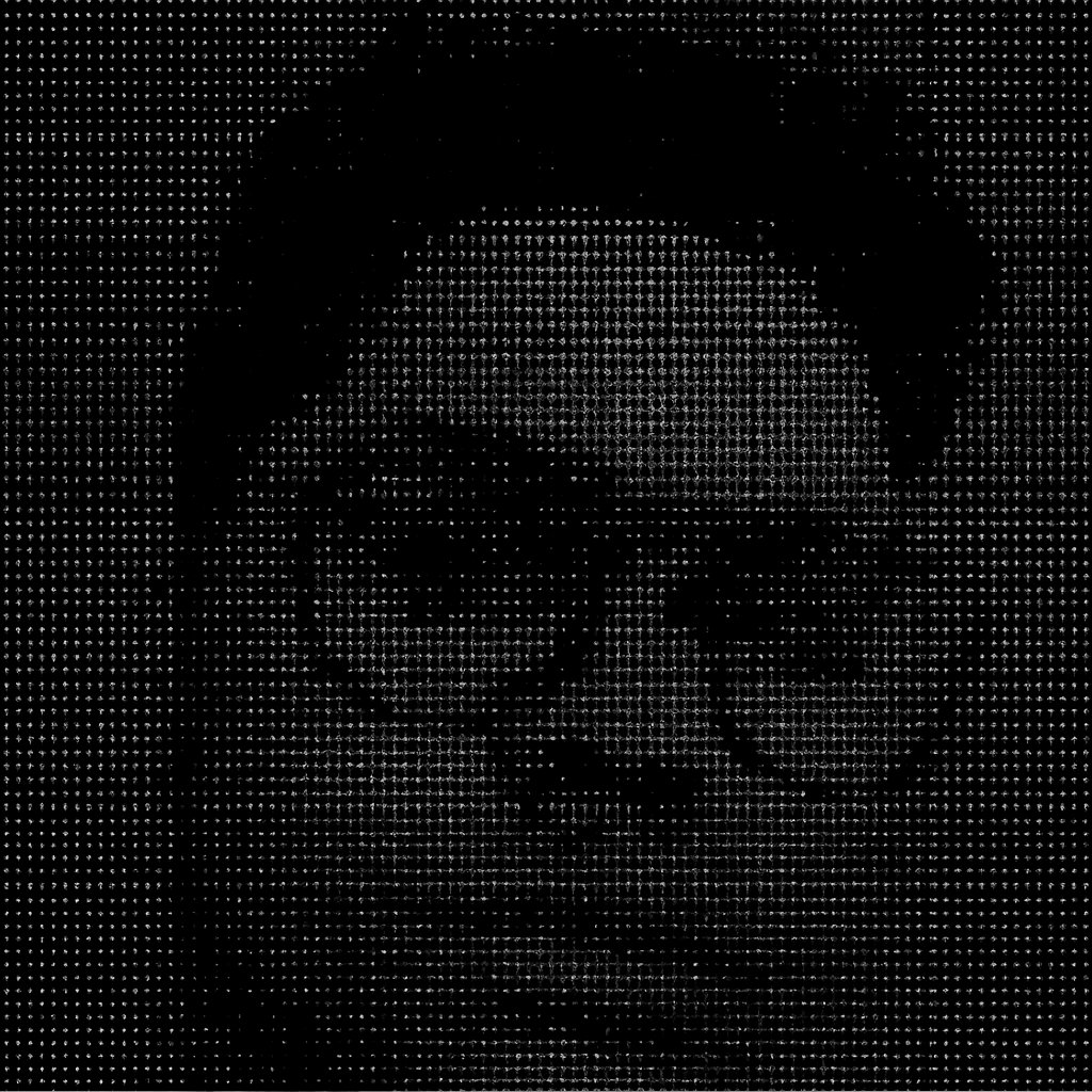 a man wearing glasses and a striped shirt