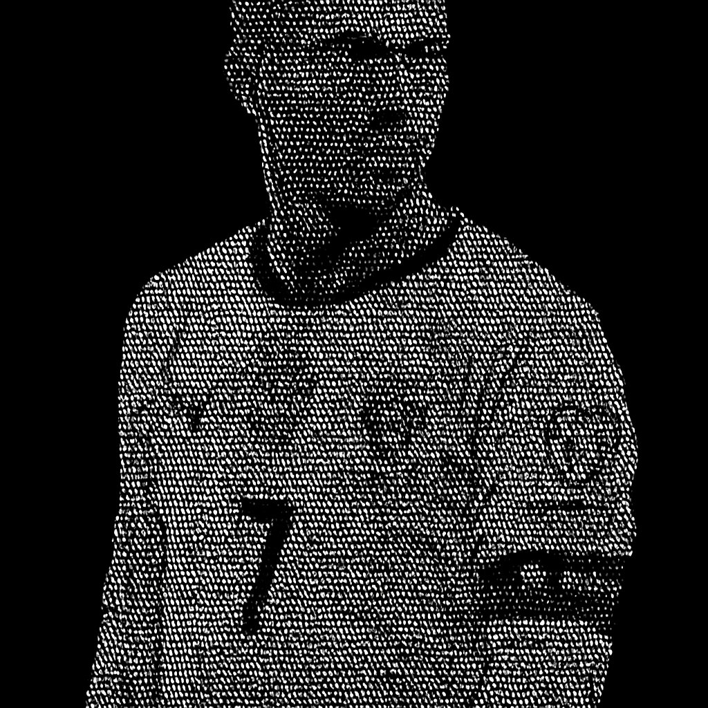 a male soccer player in a white uniform