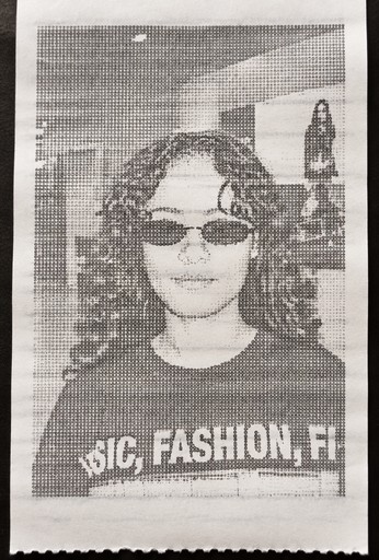 ASCII-style grayscale portrait of a person wearing sunglasses and a printed shirt